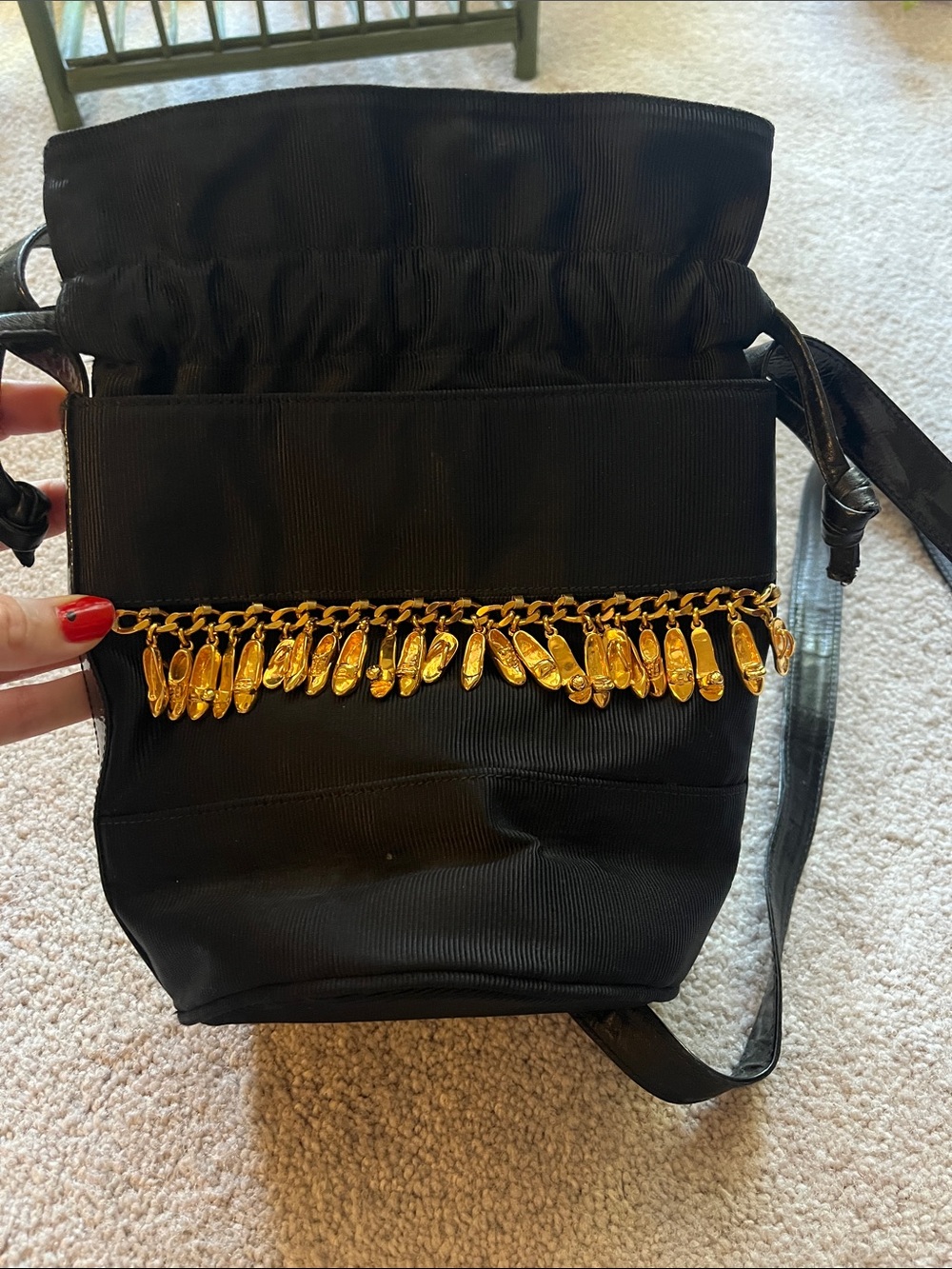 Designer Stuart Weitzman Black Crossbody Bag with Gold Shoe Charm Trim